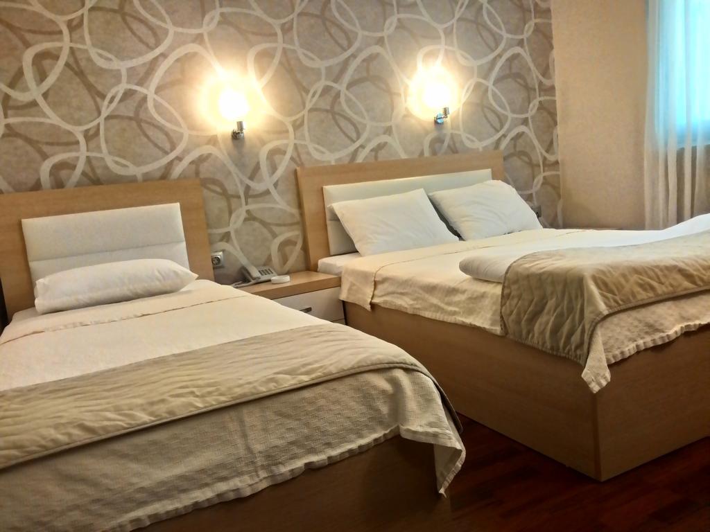 Gueney Adana Otel Quarto foto