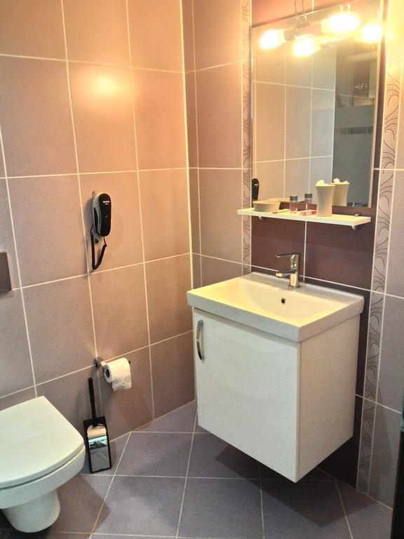 Gueney Adana Otel Quarto foto