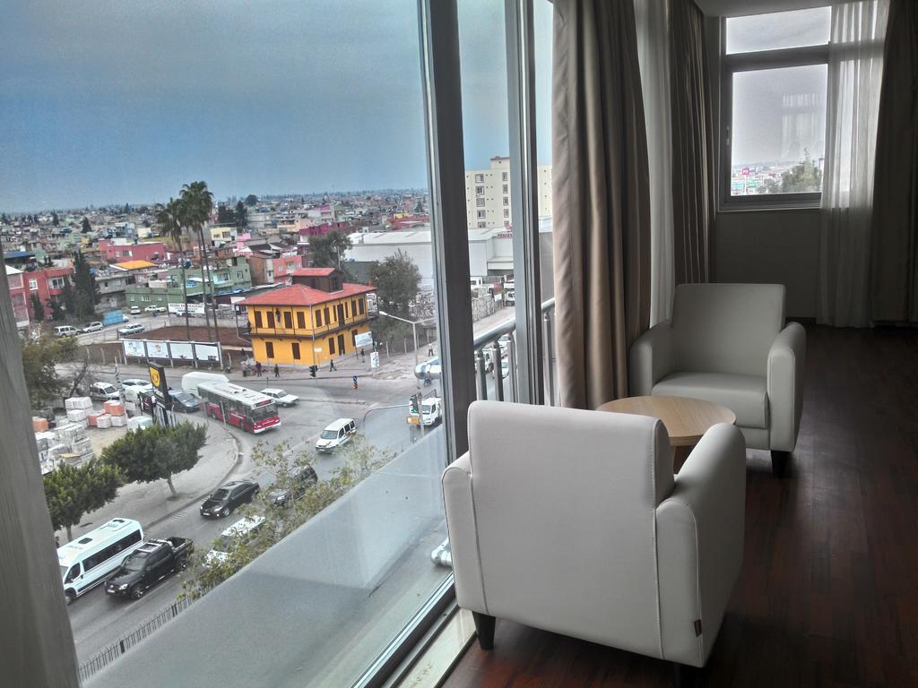 Gueney Adana Otel Quarto foto