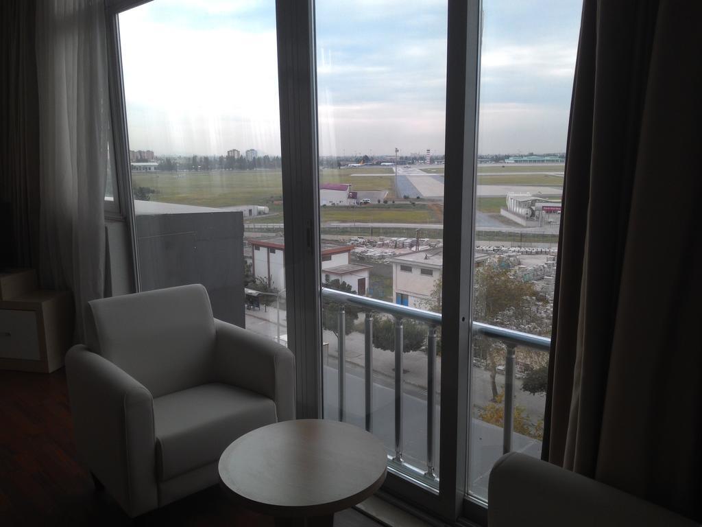 Gueney Adana Otel Quarto foto