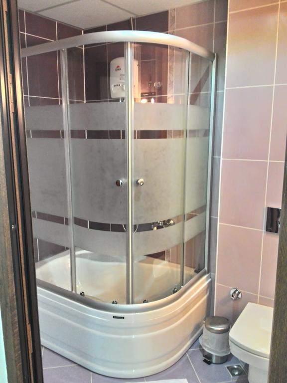 Gueney Adana Otel Quarto foto